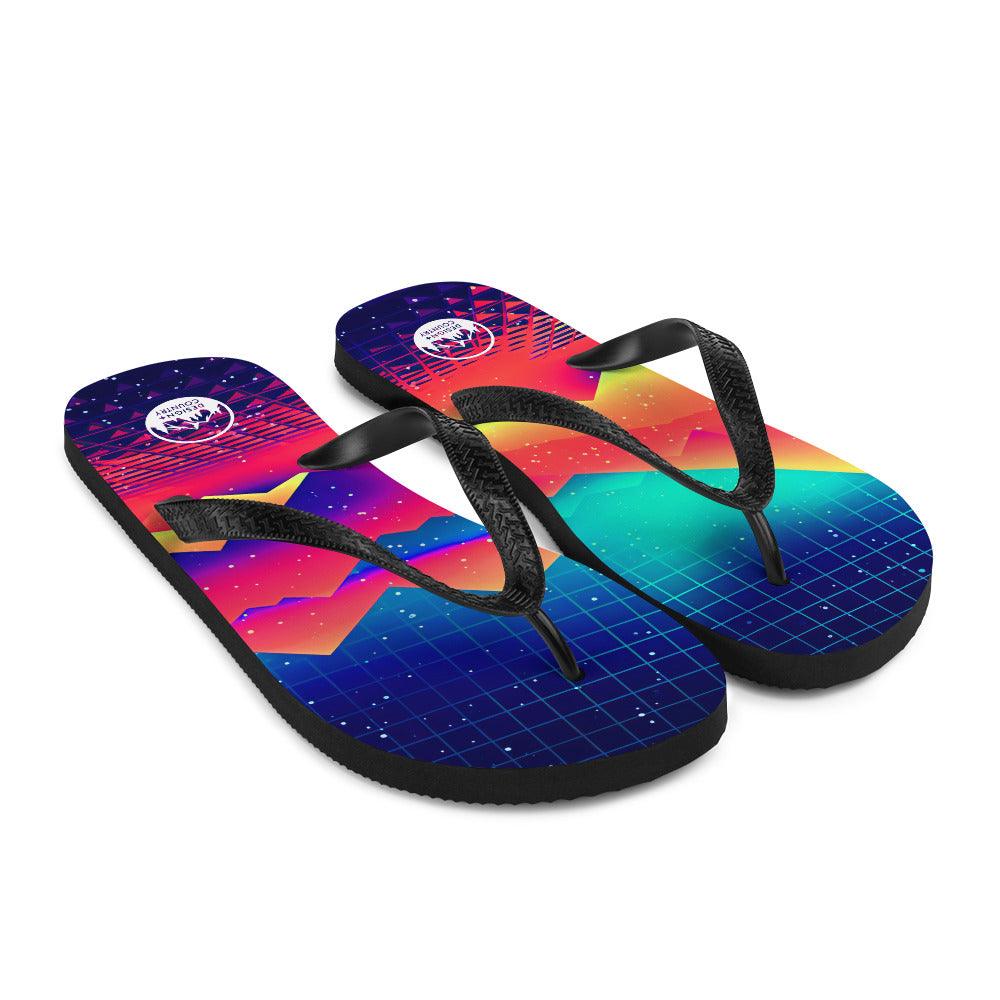 Techno - Synth Rave Flip-Flops with colorful grid design and black straps.
