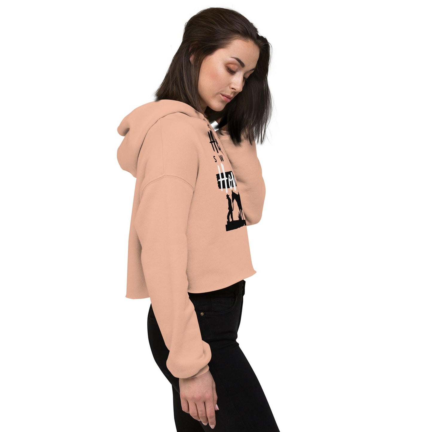 Home Sweet Home Crop Hoodie in pink with equestrian design, worn by a woman, featuring a cozy cropped fit with raw hem.