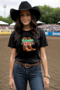 Cowgirl Strength T-Shirt with cowboy boots and flowers design.