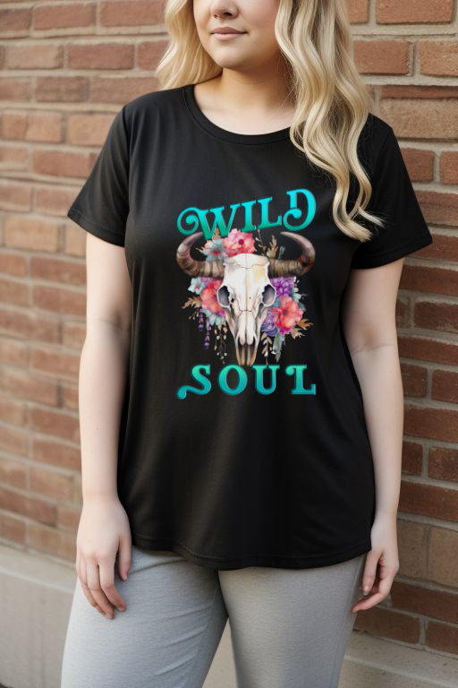 Cowgirl Strength Tee featuring "Wild Soul" design with floral bull skull, embodies feminine energy and western spirit.