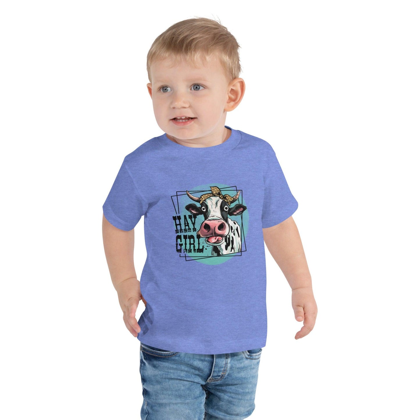 Hay Girl Toddler T-ShirtLet your toddler do their thing while feeling super comfy and looking extra stylish in this short-sleeve jersey t-shirt from 100% cotton in our Hay Girl! Perfect forT-ShirtDesign + CountryDesign + CountryHay Girl Toddler