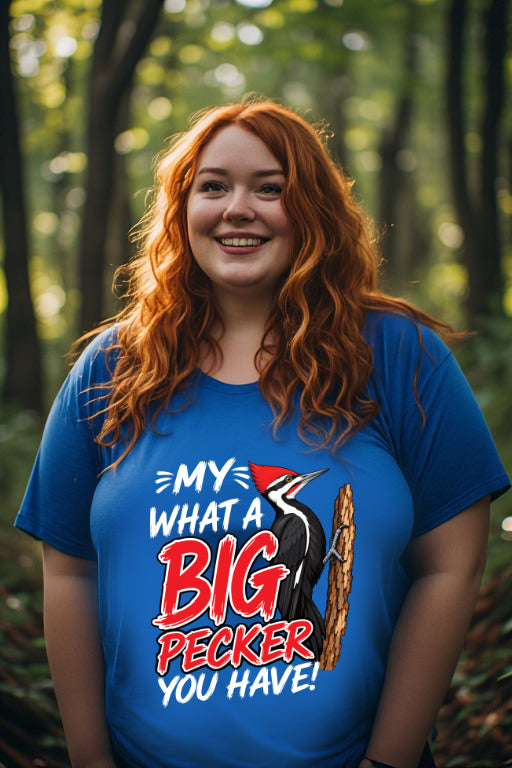 Model wearing a blue Woodpecker Tee with a cheeky woodpecker graphic in a sunlit forest